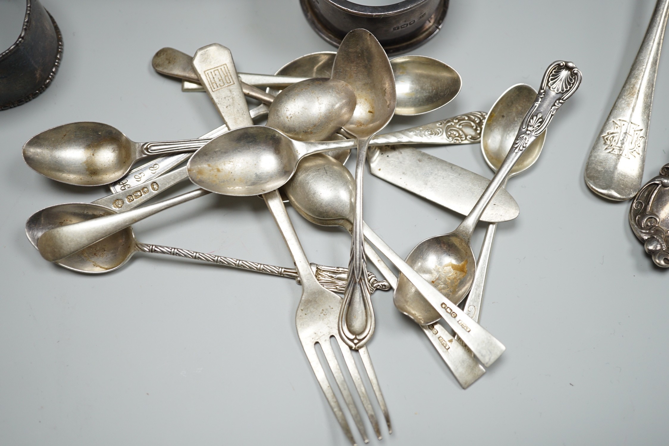 Sundry small silver including a 1930's cream jug, a Victorian mustard pot (no liner), two napkin rings and a small quantity of assorted silver and sterling flatware, 20.8oz.